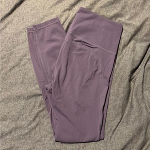 Light purple leggings with pockets.